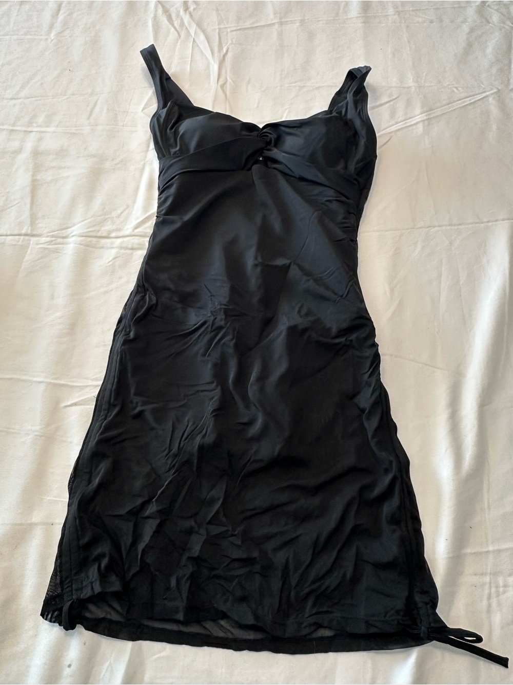 Sleek Black Mini Dress with Sweetheart Neckline